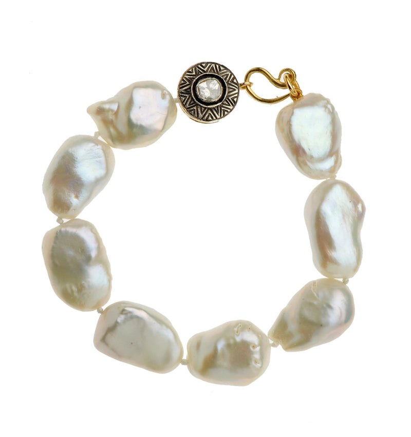 Large Fresh Water Pearls Bracelet with a lovely Large Sterling Silver and Diamonds center on 18K Gold. Very Classic and Unique for any occasion. One Of A Kind! 